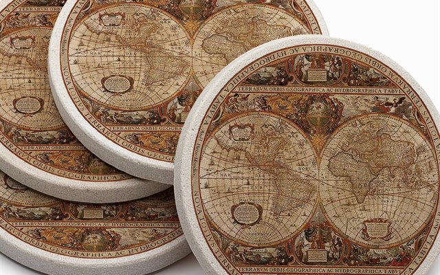 Antique map coasters stacked, the border design running to the edge